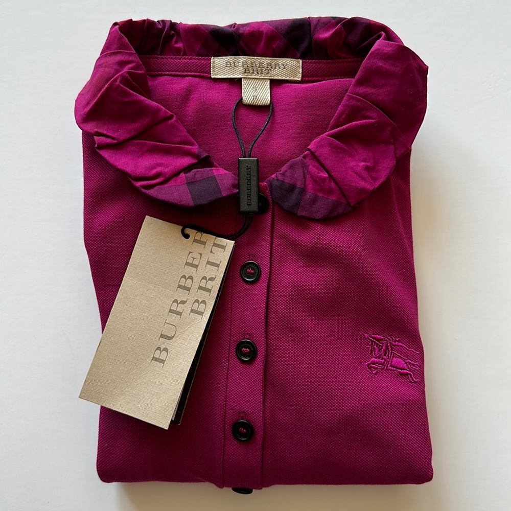 Authentic New with tag BURBERRY BRIT
Mock Neck Long Sleeve Polo
Size: S